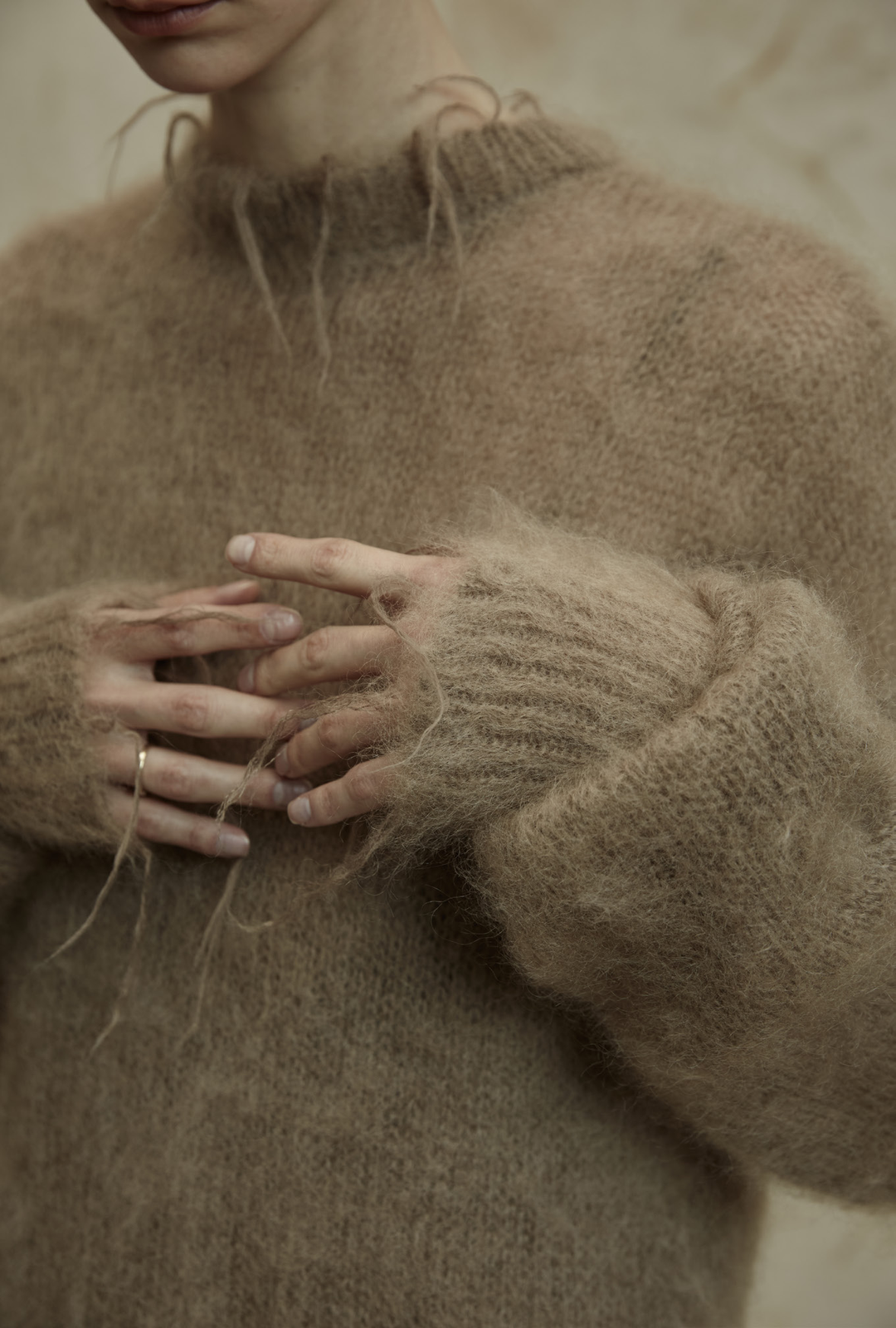 Fringed knit sweater